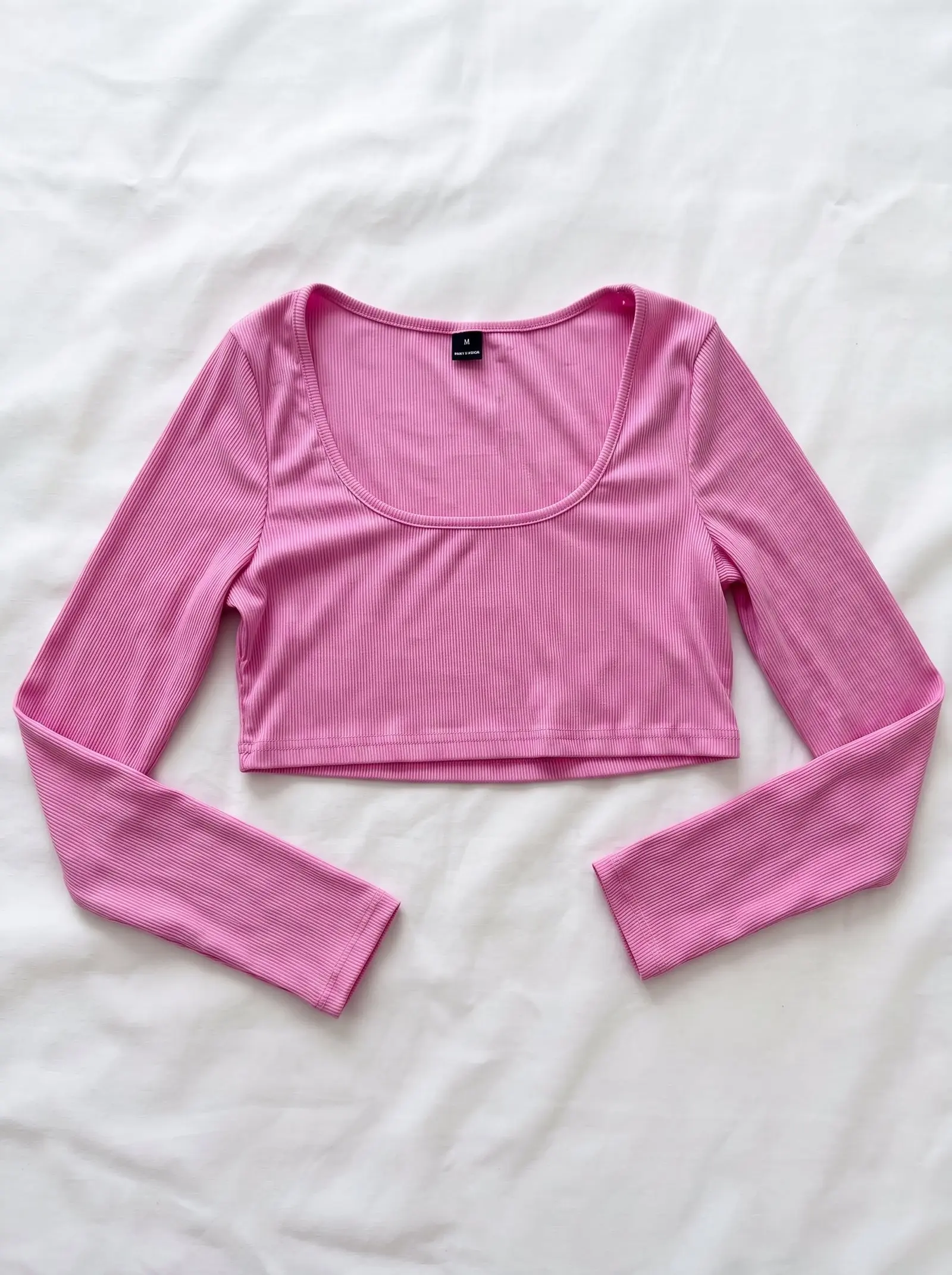 Top Vela manga larga en rosa